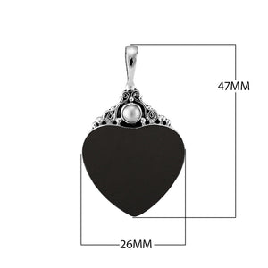 Sterling silver heart pendant with black shell and round Mother of Pearl accent, handcrafted Bali jewelry available for wholesale purchase.