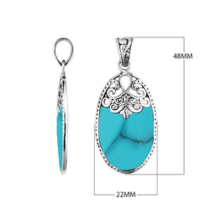 Wholesale sterling silver oval pendant with genuine turquoise inlay and ornate Balinese filigree detailing, handcrafted in Bali.