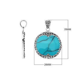 Wholesale sterling silver round pendant with black shell inlay, ornate floral Bali design, handcrafted jewelry from Bali Designs Inc.