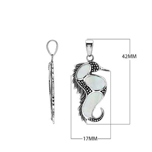 Wholesale sterling silver seahorse pendant with genuine mother of pearl inlay, handcrafted in Bali – artisan ocean-inspired jewelry for bulk buyers.