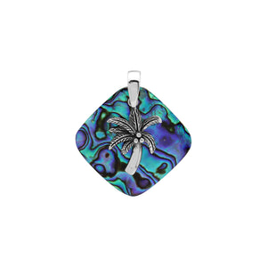 Sterling silver palm tree pendant on abalone shell diamond-shaped base, handmade in Bali for wholesale jewelry buyers.