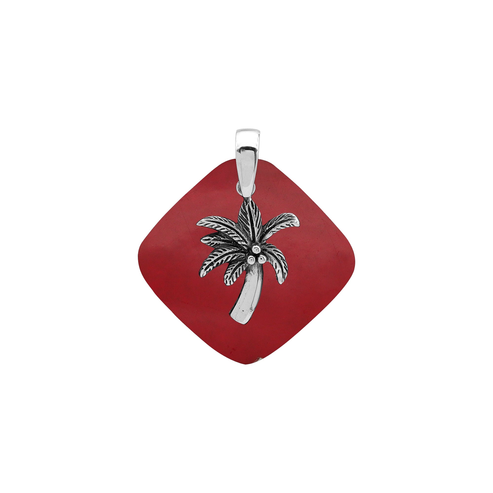 Sterling silver palm tree pendant on coral diamond-shaped base, handmade in Bali for wholesale jewelry buyers.