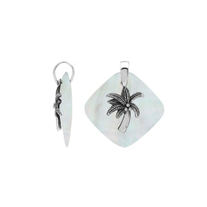 Sterling silver palm tree pendant on Mother of Pearl diamond-shaped base, handmade in Bali for wholesale jewelry buyers.
