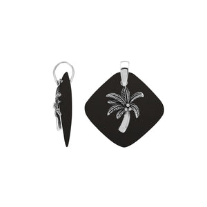 Sterling silver palm tree pendant on black shell diamond-shaped base, handmade in Bali for wholesale jewelry buyers.
