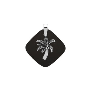 Sterling silver palm tree pendant on black shell diamond-shaped base, handmade in Bali for wholesale jewelry buyers.