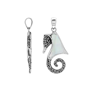 Sterling silver seahorse pendant with Mother of Pearl inlay and Balinese scroll detailing, handmade in Bali for wholesale buyers.
