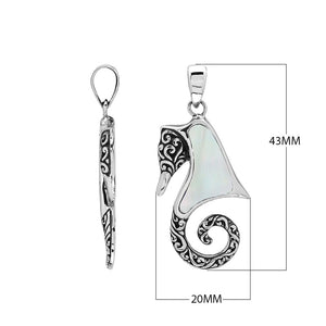 Sterling silver seahorse pendant with Mother of Pearl inlay and Balinese scroll detailing, handmade in Bali for wholesale buyers.