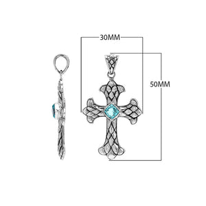 Sterling silver cross pendant with faceted Blue Topaz Quartz and Balinese textured silver design, wholesale artisan jewelry.