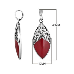 Handcrafted Red Coral Marquise Pendant With Detailed Silver Overlay Design