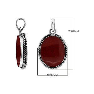 925 sterling silver oval pendant with red coral and twisted rope frame handcrafted in Bali