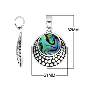 Round sterling silver pendant with abalone shell and dotted Balinese pattern handcrafted in Bali.
