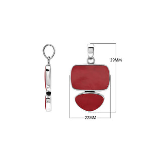 Sterling silver double-shape pendant featuring red coral stones with polished surface and intricate Balinese craftsmanship.