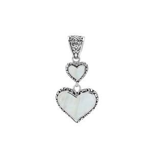 Sterling silver double heart pendant with Mother of Pearl and Balinese patterns in polished finish.