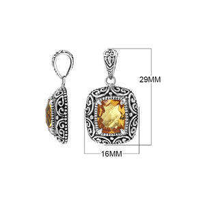 Sterling silver cushion pendant featuring a faceted Citrine Quartz centerpiece accented with intricate Balinese scroll carvings and a polished decorative frame.