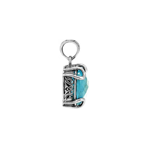 Sterling silver cushion pendant featuring a faceted Blue Topaz Quartz centerpiece secured by artistic prong detailing with traditional Balinese carved accents.