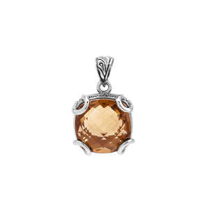Sterling silver cushion pendant featuring a faceted Morganite Quartz centerpiece secured with artistic prong detailing and traditional Balinese carved embellishments.