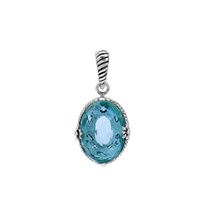 Sterling silver oval pendant with faceted Blue Topaz Quartz and rope-accent Balinese detail.