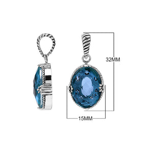 Sterling silver oval pendant with faceted Blue Topaz Quartz and rope-accent Balinese detail.