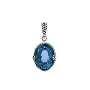 Sterling silver pendant with London Blue Topaz Quartz and rope-accent Balinese oval design.