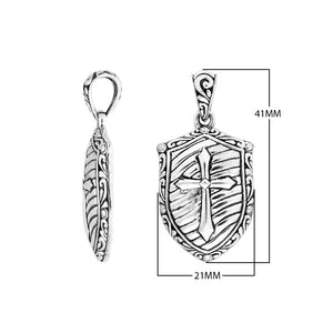 Shield-shaped sterling silver pendant featuring an engraved cross symbol with textured detailing and polished borders suitable for classic wholesale jewelry presentations