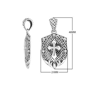 Sterling silver shield-shaped pendant featuring an engraved cross design with textured lattice background and decorative border suitable for classic wholesale jewelry collections