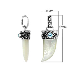Sterling silver Shell tusk pendant with Blue Topaz Quartz and detailed Balinese oxidized silverwork.