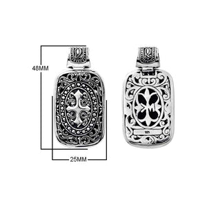 A wholesale Silver Overlay Over Copper rectangular pendant featuring deep oxidized Balinese scrollwork, raised detailing, polished overlay texture, and traditional craftsmanship ideal for bulk jewelry buyers.