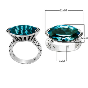 Wholesale sterling silver marquise-cut blue topaz ring with Bali-inspired band design – bulk gemstone statement jewelry for resellers.