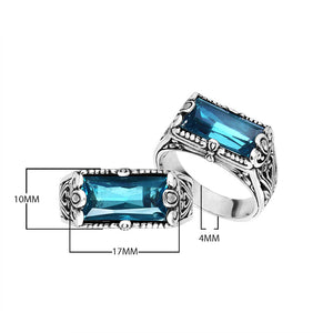 Wholesale sterling silver rectangular London Blue Topaz Quartz ring with faceted Quartz and handcrafted Bali-inspired detailing, artisan jewelry for bulk orders.