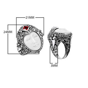 Wholesale sterling silver ring with carved Bone Face, square-cut Garnet Quartz, and intricate Balinese floral carvings, handcrafted artisan jewelry.