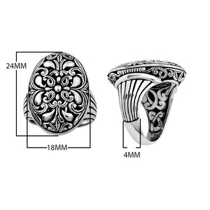 Sterling silver oval floral signet ring in bulk wholesale, handcrafted in Bali with oxidized finish and detailed scrollwork design.