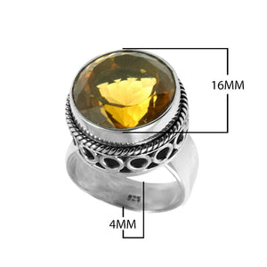 Wholesale sterling silver citrine ring with faceted golden Quartz, twisted rope bezel, and cutout band detailing – handcrafted Balinese artisan jewelry.