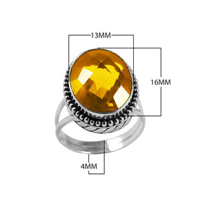 Wholesale sterling silver ring with faceted oval Citrine Quartz, Balinese beaded border design – bulk handcrafted statement jewelry.