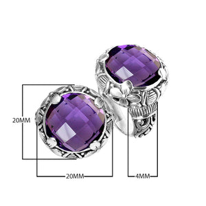 Sterling silver ring with round Amethyst Quartz and Balinese floral carvings.