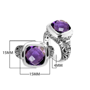 Sterling silver ring with cushion-cut Amethyst Quartz and Balinese carvings.