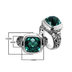 Sterling silver ring with cushion-cut Green Quartz and Balinese scroll carvings.