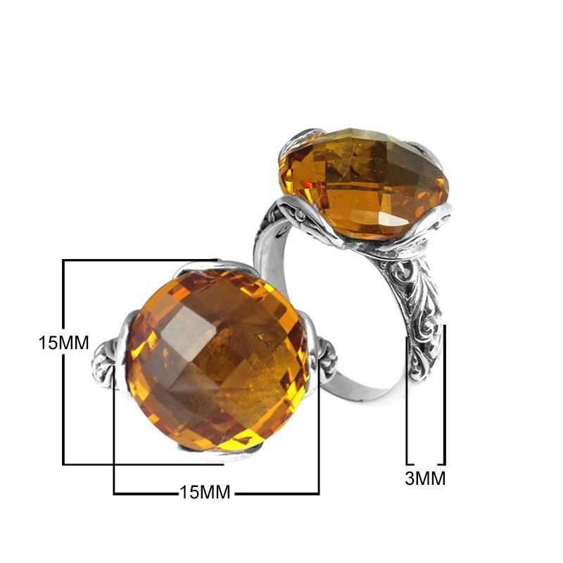 Sterling silver ring with faceted round Citrine Quartz and Balinese scrollwork, handcrafted in Bali.