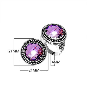 Sterling silver ring with faceted Amethyst Quartz, beaded halo, and Balinese carvings handcrafted in Bali.