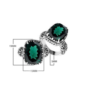 Sterling silver handcrafted Bali ring with cushion-cut Green Quartz and scrollwork design.