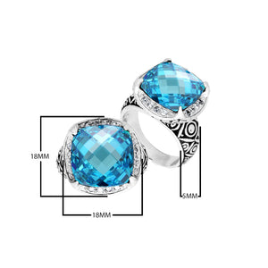 Wholesale sterling silver ring with cushion-cut Blue Topaz Quartz and Balinese carvings, handcrafted in Bali.