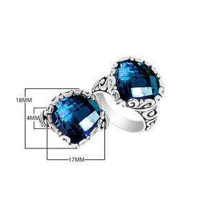 Wholesale sterling silver ring with cushion-cut London Blue Topaz Quartz and Balinese scrollwork.