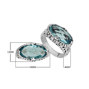 Handcrafted Blue Topaz Quartz oval sterling silver ring with floral detailing from Bali Designs Inc