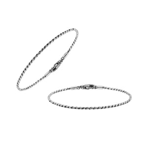 Sterling silver twisted chain bracelet featuring a secure hook lock and polished surface, designed for wholesale jewelry retailers seeking timeless and durable catalog pieces.