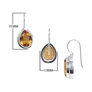 Sterling Silver pear-cut Citrine Quartz hook earrings handcrafted in Bali with a smooth bezel frame and polished finish.