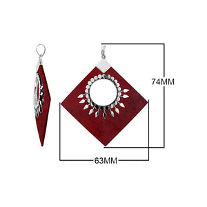 Sterling Silver Diamond Pendant Featuring Red Coral With Sunburst Medallion.