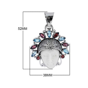 Sterling Silver Blue Topaz Quartz Garnet Quartz Bone Face Pendant With Ornate Balinese Headdress.