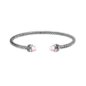 Sterling Silver Twisted Cable Bangle With Pink Freshwater Pearls and Tribal Oxidized Detailing For Wholesale Buyers.