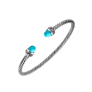 Sterling Silver Twisted Cable Bangle With Turquoise Shell and Oxidized Tribal Detailing For Wholesale Buyers.