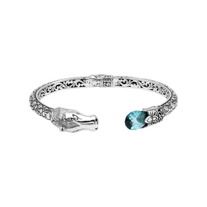 Sterling Silver Dragon Head Bangle with Blue Topaz Quartz handcrafted in Bali featuring intricate filigree and oxidized detailing.