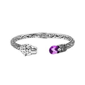 Sterling silver panther head cuff bangle with amethyst quartz ends and floral carvings handcrafted in Bali.
